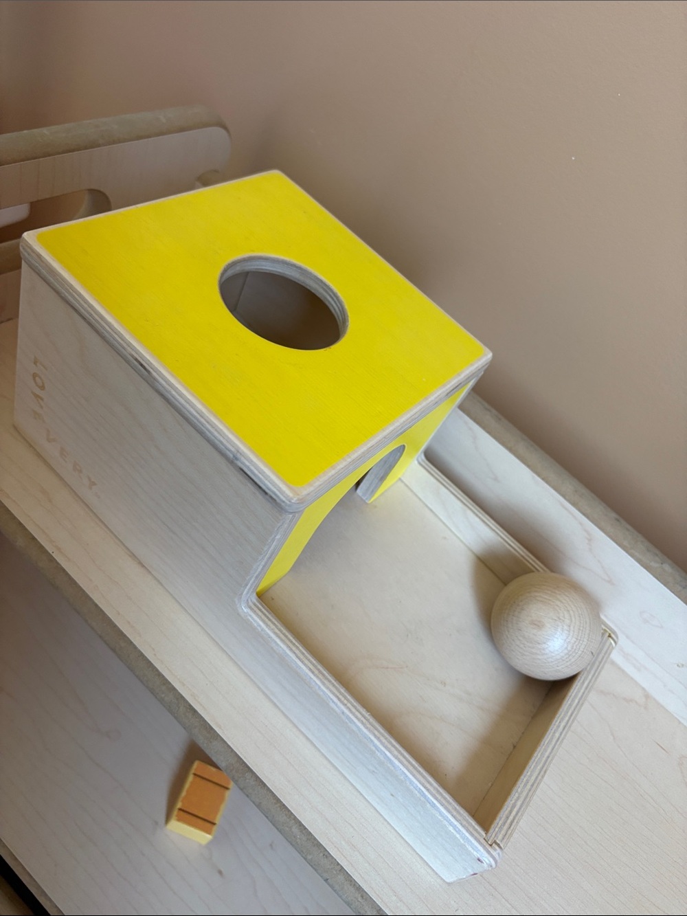 Lovevery Wooden Ball Drop Toy with Bright Yellow Top